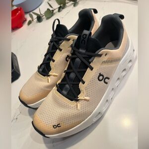 On Running Blonde and Ivory Sneakers